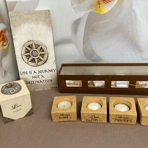 Candle holders and wall plaque from specialty shop.